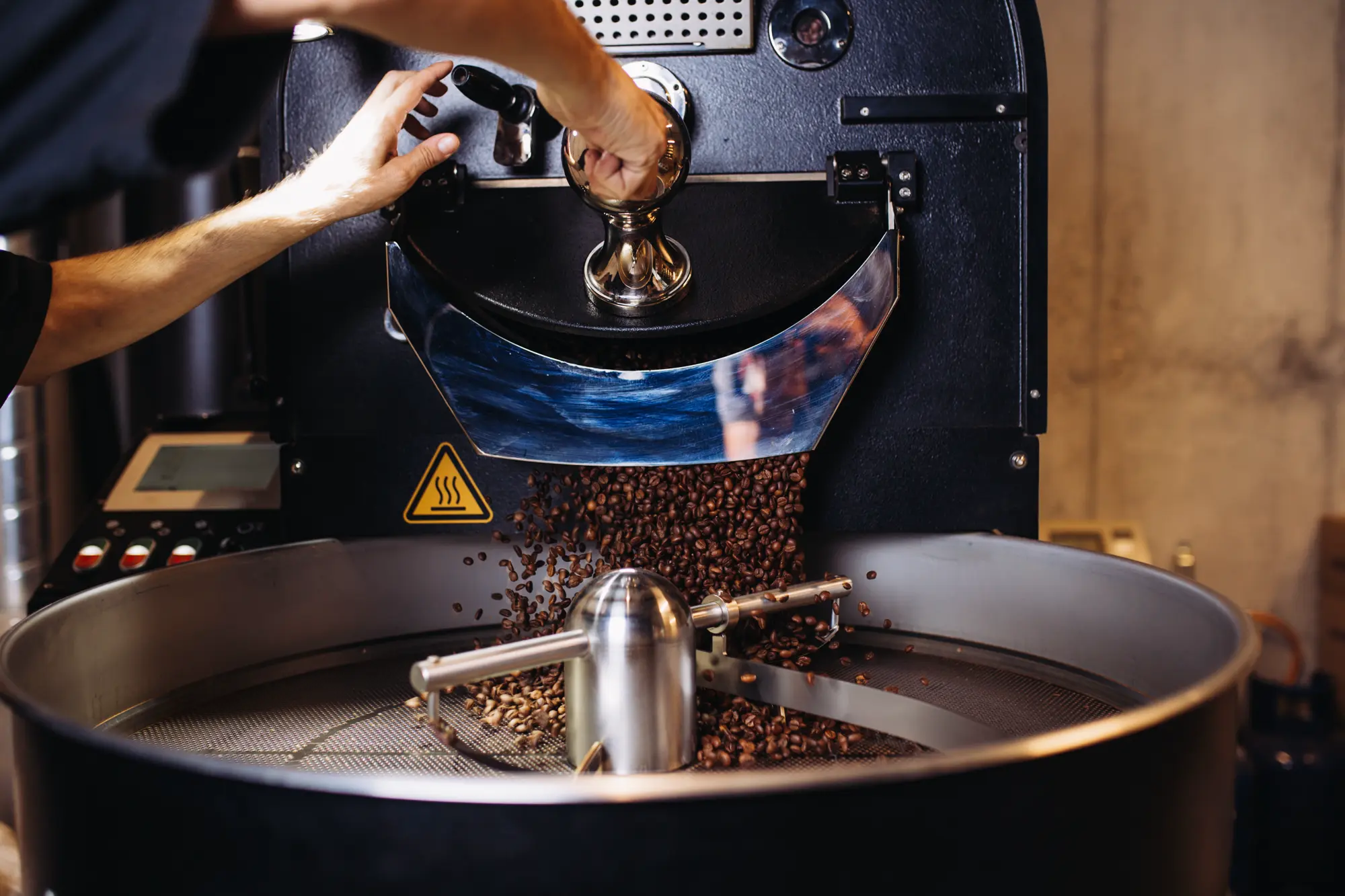 man roasting coffee
